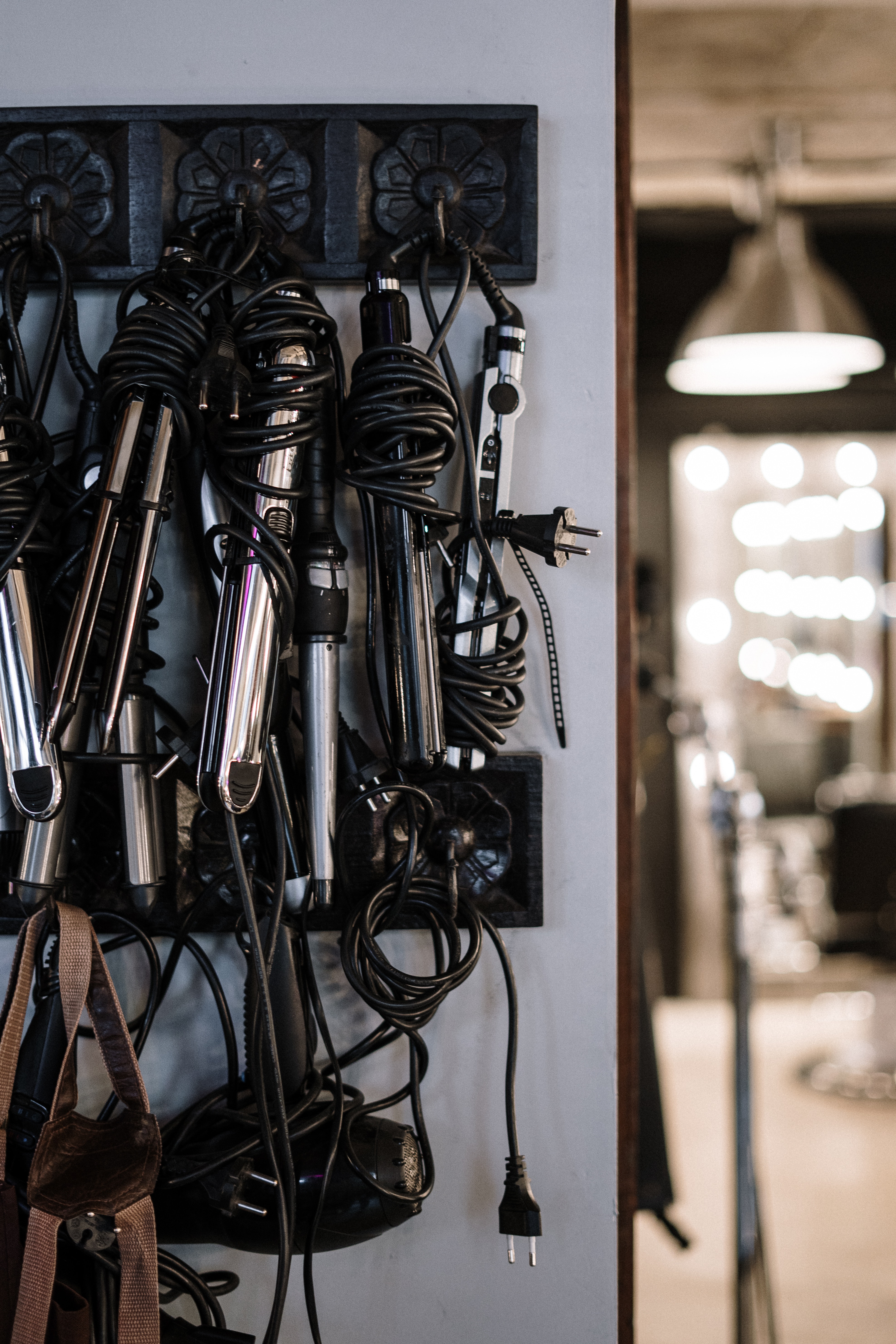 Hair Styling Tools Hanging in Salon