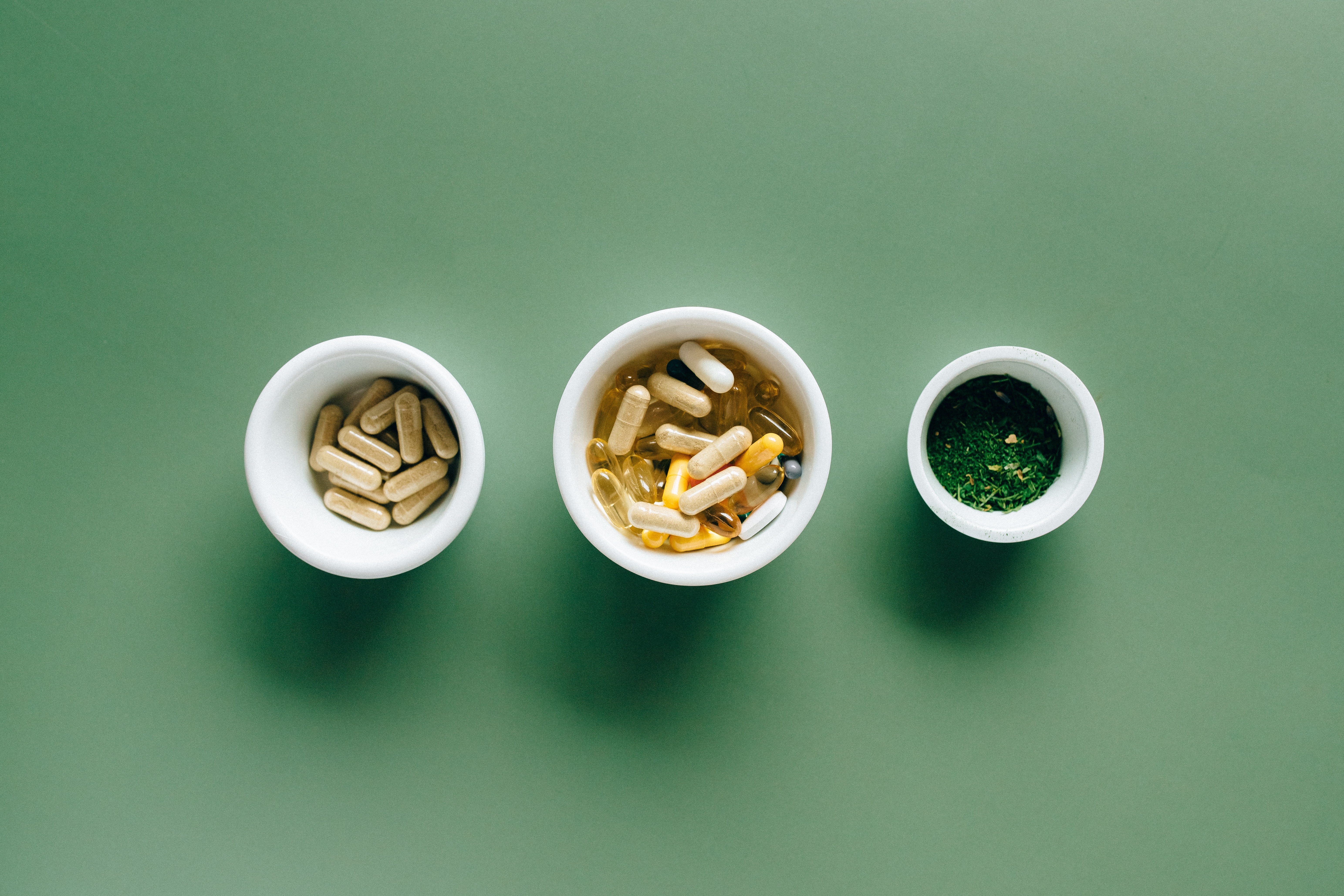 Herbal Supplements in Small White Bowls